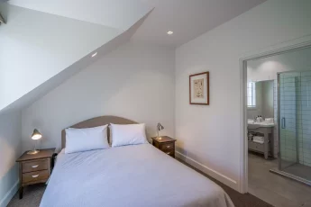 Cosy master bedroom at Tinkerbell Cottage