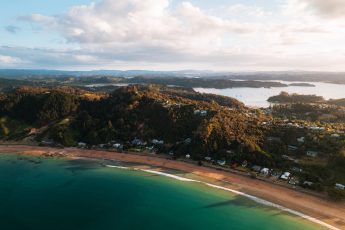Aerial view looking back towards Long Beach and Cloud 9, luxury holiday rental - Bay of Islands, New Zealand