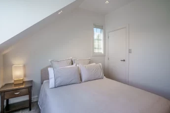 Sunny second bedroom upstairs at Bellbird Cottage