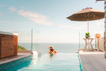 Cloud 9's Infinity pool overlooking Long Beach and the Pacific Ocean in the Bay of Islands, New Zealand