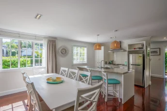 Sunny, open plan dining area and kitchen at Capital Cottage