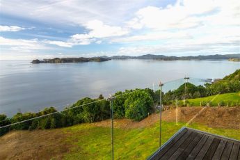 Glass balcony to maximise the view over the Pacific Ocean - Ocean View, Bay of Islands Holiday Homes, New Zealand