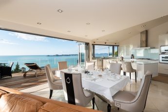 Heaven NZ - dining, kitchen area both have wonderful views over the ocean
